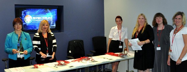 Volunteers gather at the chapter’s October Women in Intelligence Group event.